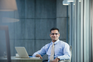 business professional with laptop